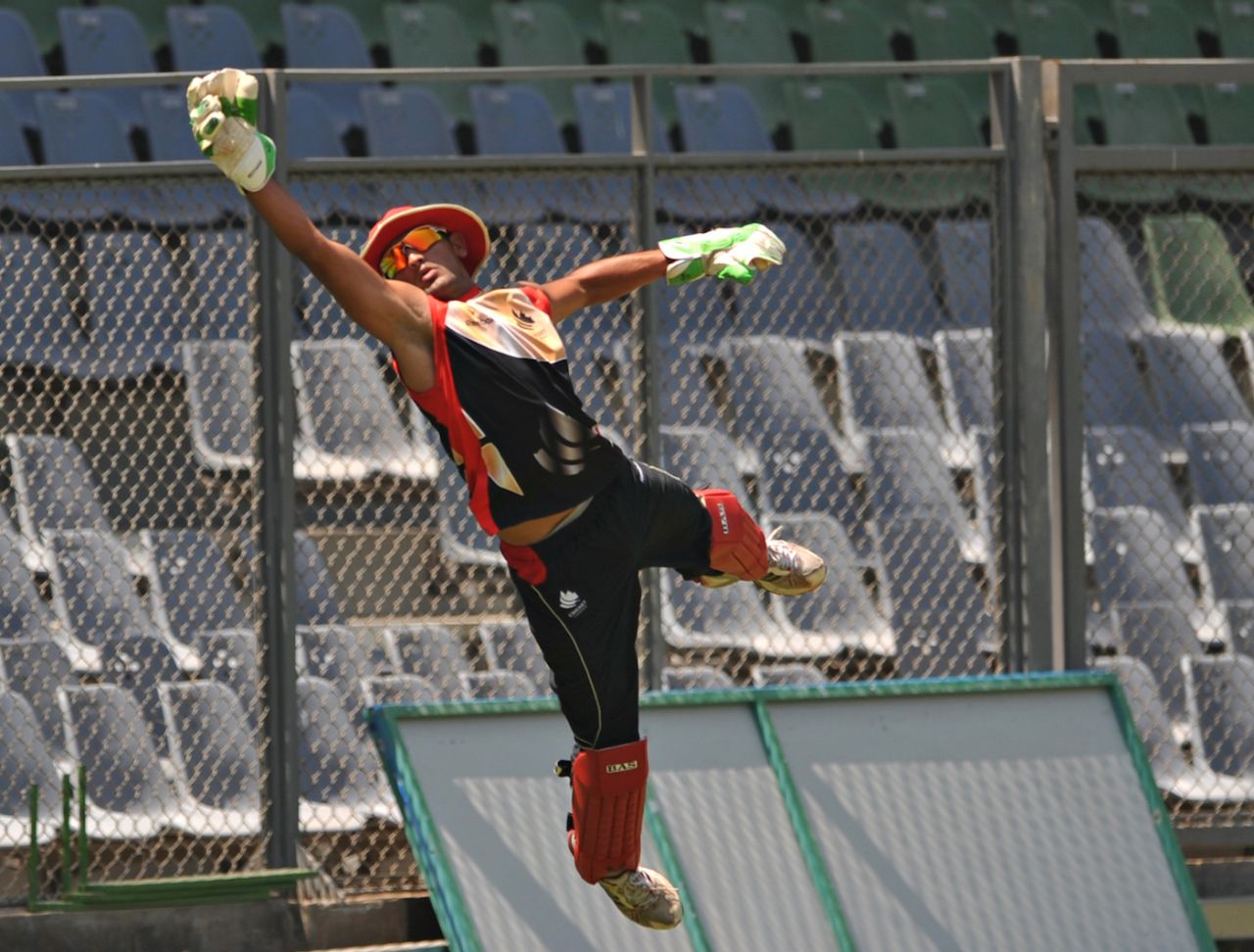 Canada's wicketkeeper Hamza Tariq in action during practice at the 2011 World Cup, Mumbai, March 11, 2011