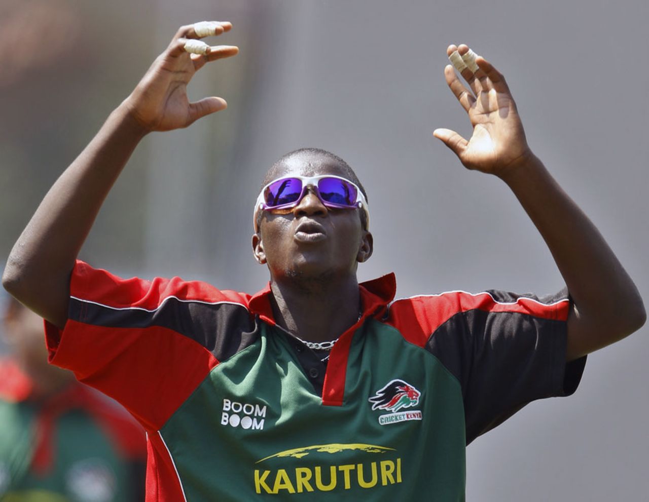 Kenya's James Ngoche reacts after bowling in the nets, Bangalore, March 11, 2011