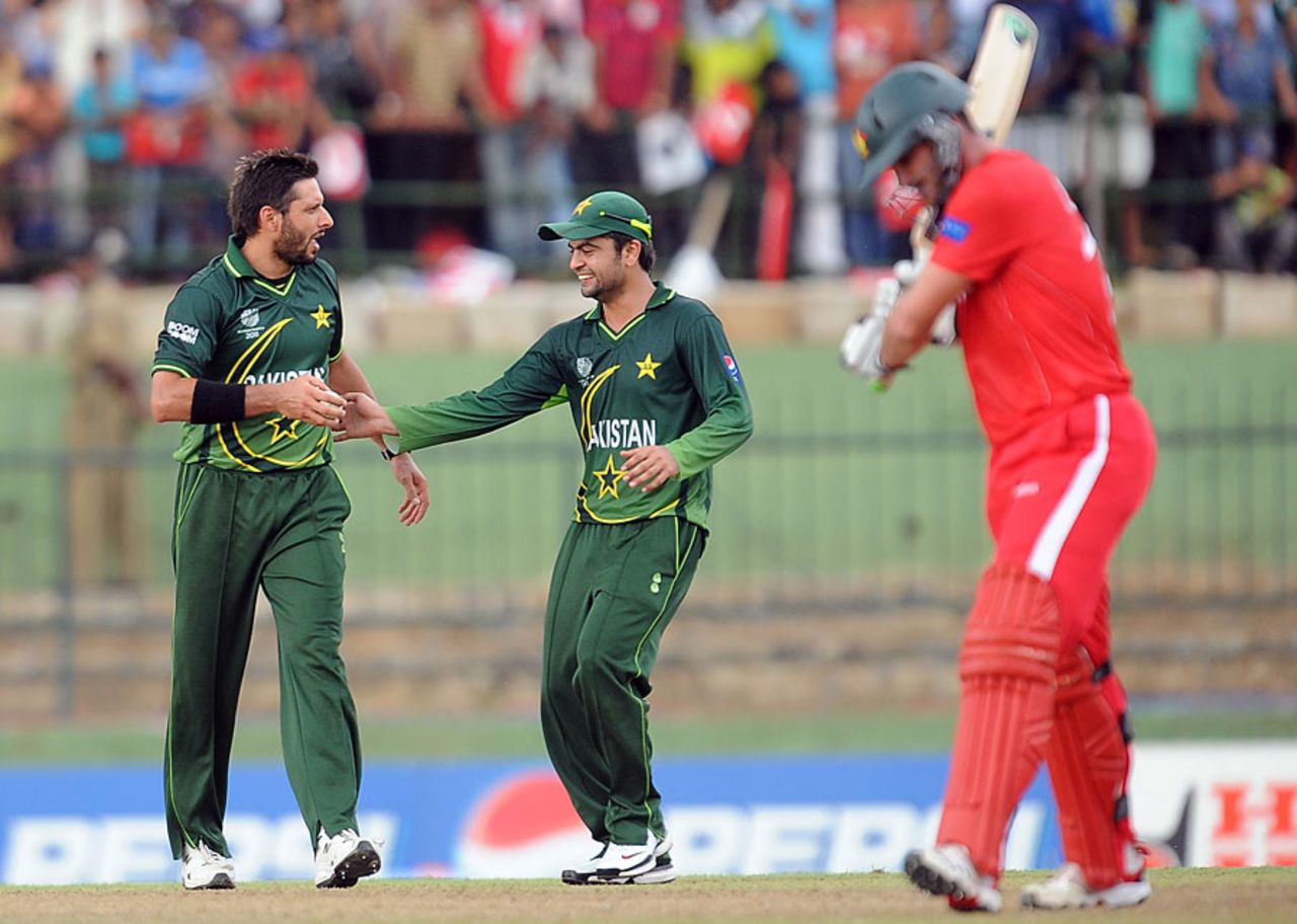 Shahid Afridi was gifted his first wicket when Greg Lamb popped back a return catch, Pakistan v Zimbabwe, World Cup, Pallekele, March 14, 2011