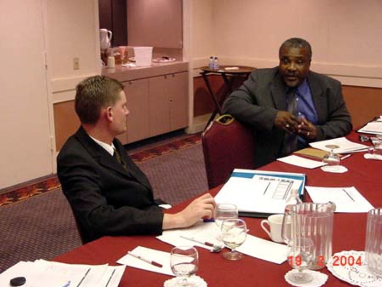 Matthew Kennedy GDM in talks with Gladstone Dainty, President USACA during the GDM visit to the Americas in February 2004