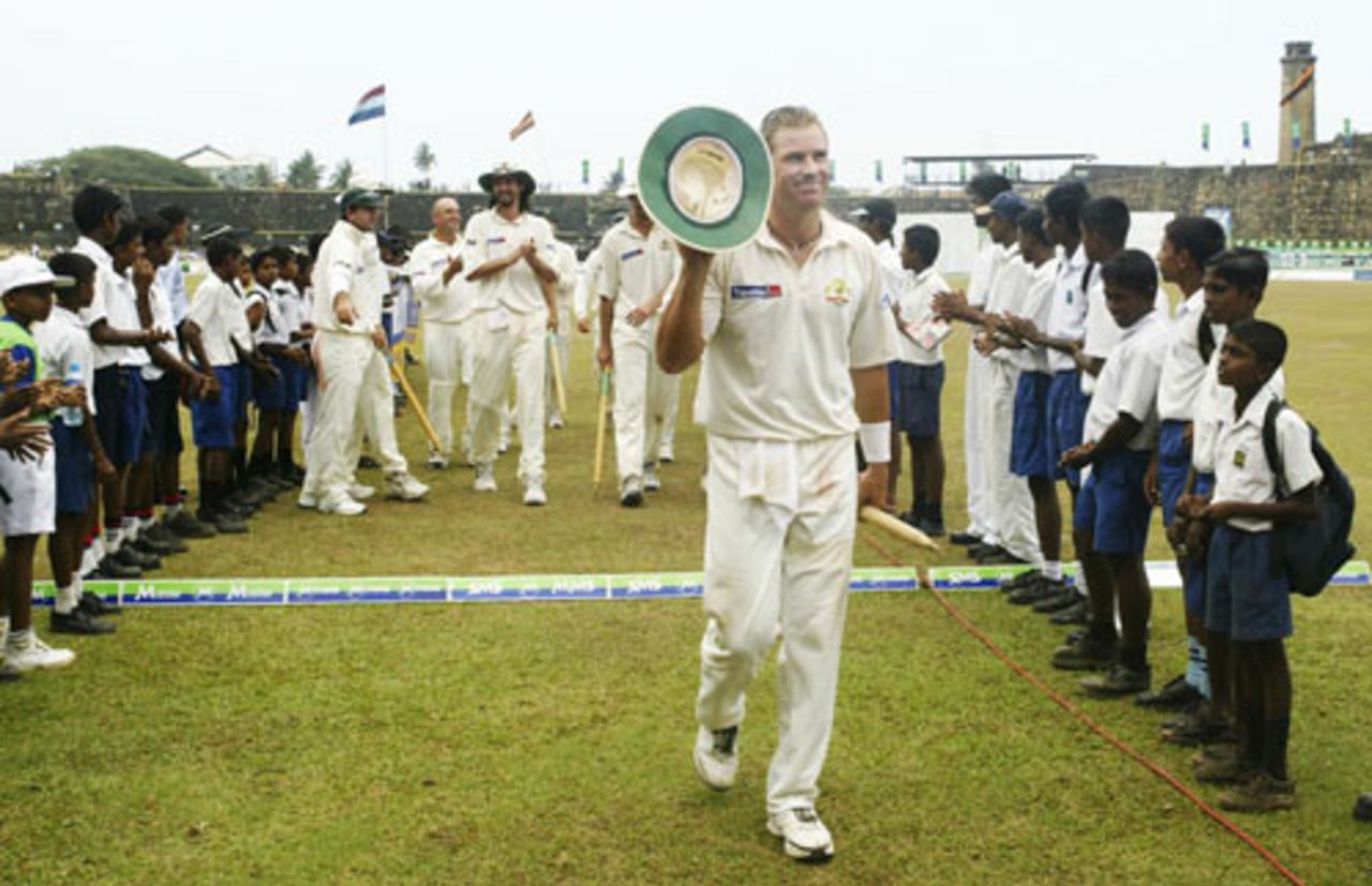 Shane Warne leaves the field at the end of the match after taking his 500th career wicket, Sri Lanka v Australia, 2nd Test, Kandy, 5th day, March 20, 2004