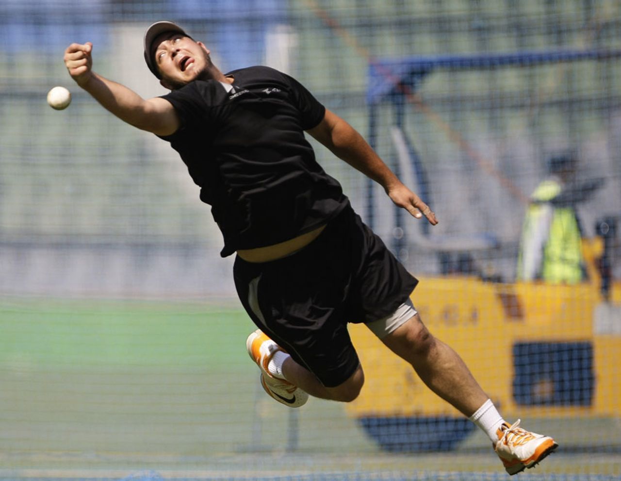 Jesse Ryder reaches out for the ball during practice, Mumbai, March 16, 2011