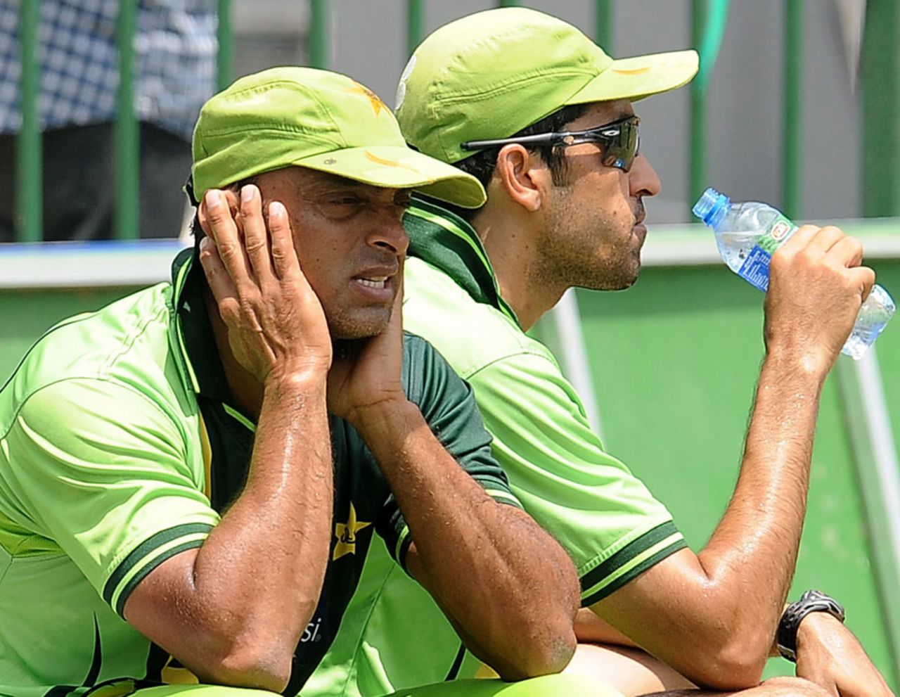 Shoaib Akhtar and Umar Gul take a break during practice, Colombo, March 18, 2011