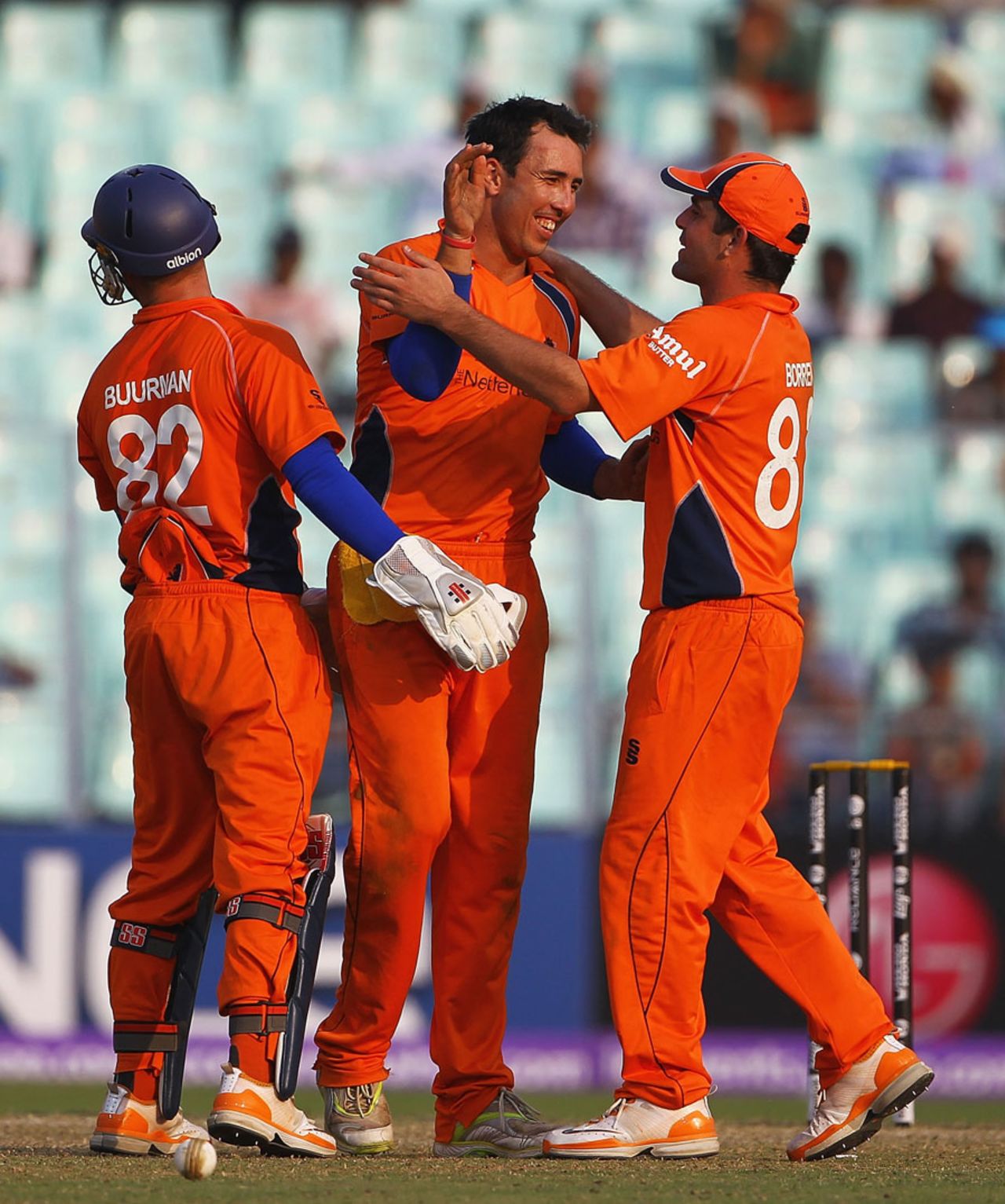 Tom Cooper is congratulated by team-mates on his dismissal of Ed Joyce, Ireland v Netherlands, World Cup 2011, Group B, March 18, 2011
