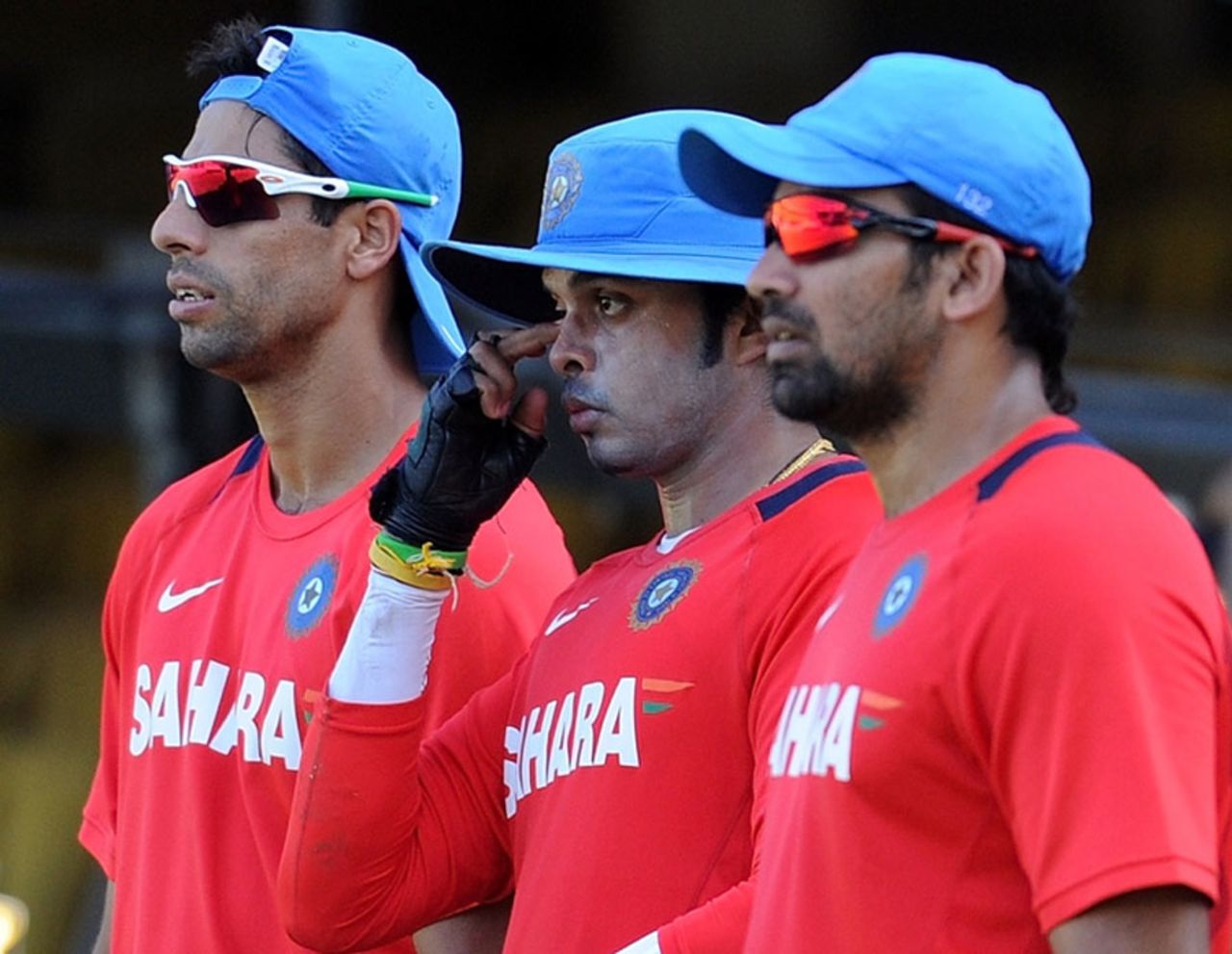 Ashish Nehra, Sreesanth and Zaheer Khan look on during a training session, Chennai, March 19, 2011