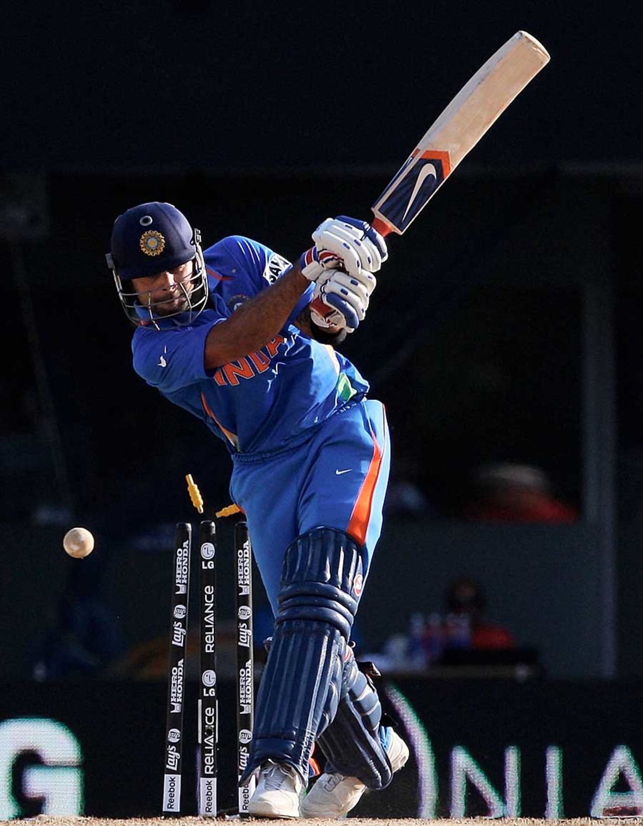 Virat Kohli swings and mises, India v West Indies, Group B, World Cup 2011, Chennai, March 20, 2011