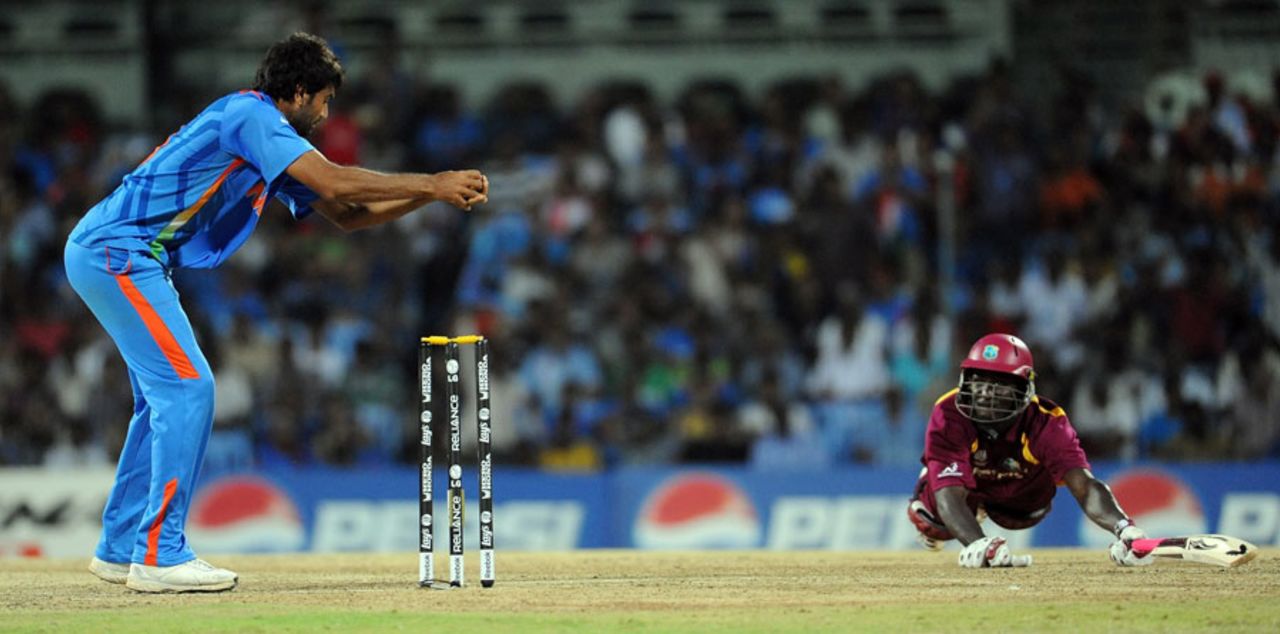 Munaf Patel takes his time in taking off the bails to run out Darren Sammy, India v West Indies, Group B, World Cup 2011, March 20, 2011