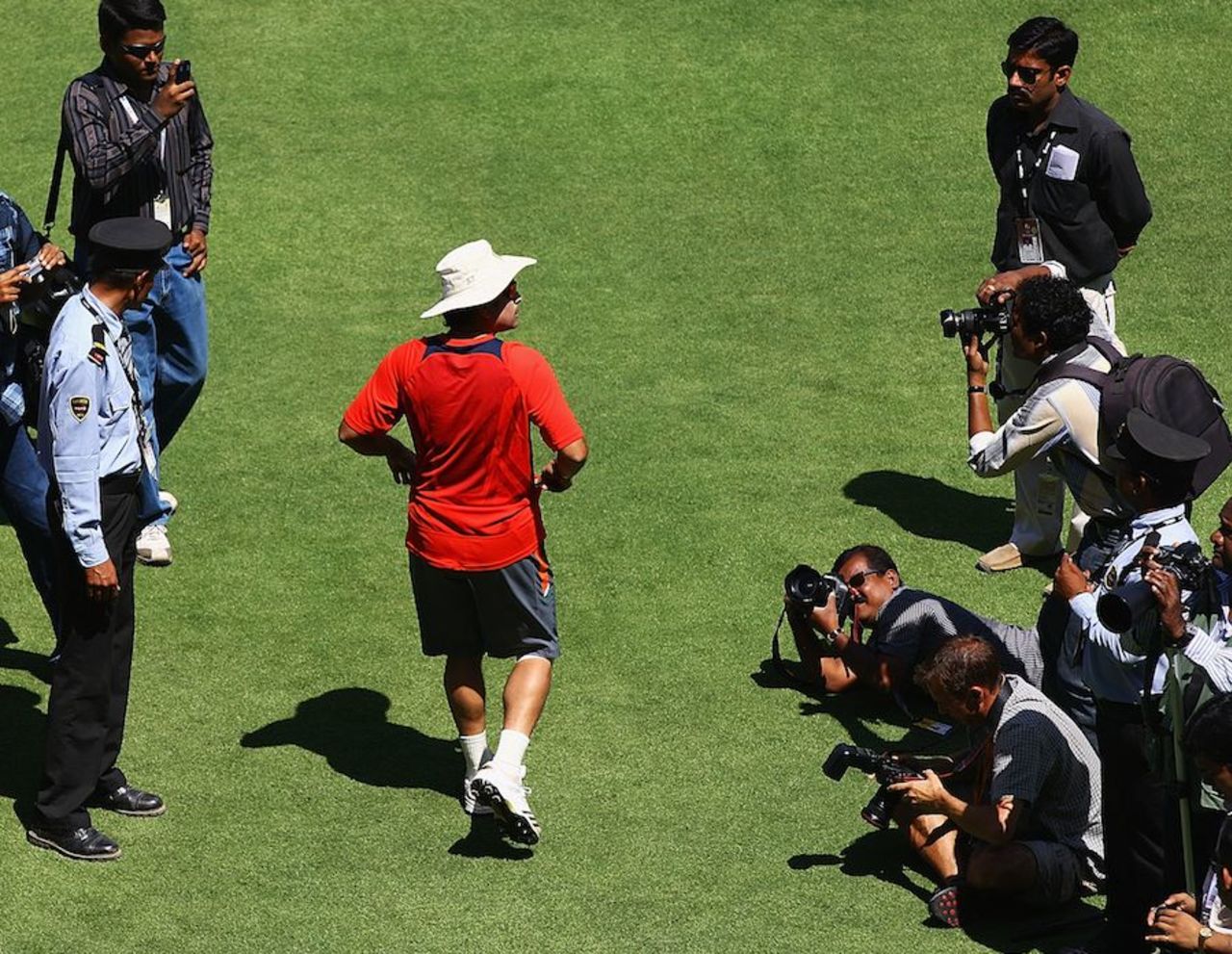 Everyone wants a picture of Sachin Tendulkar as he walks in to Motera, World Cup, Ahmedabad, March 22, 2011