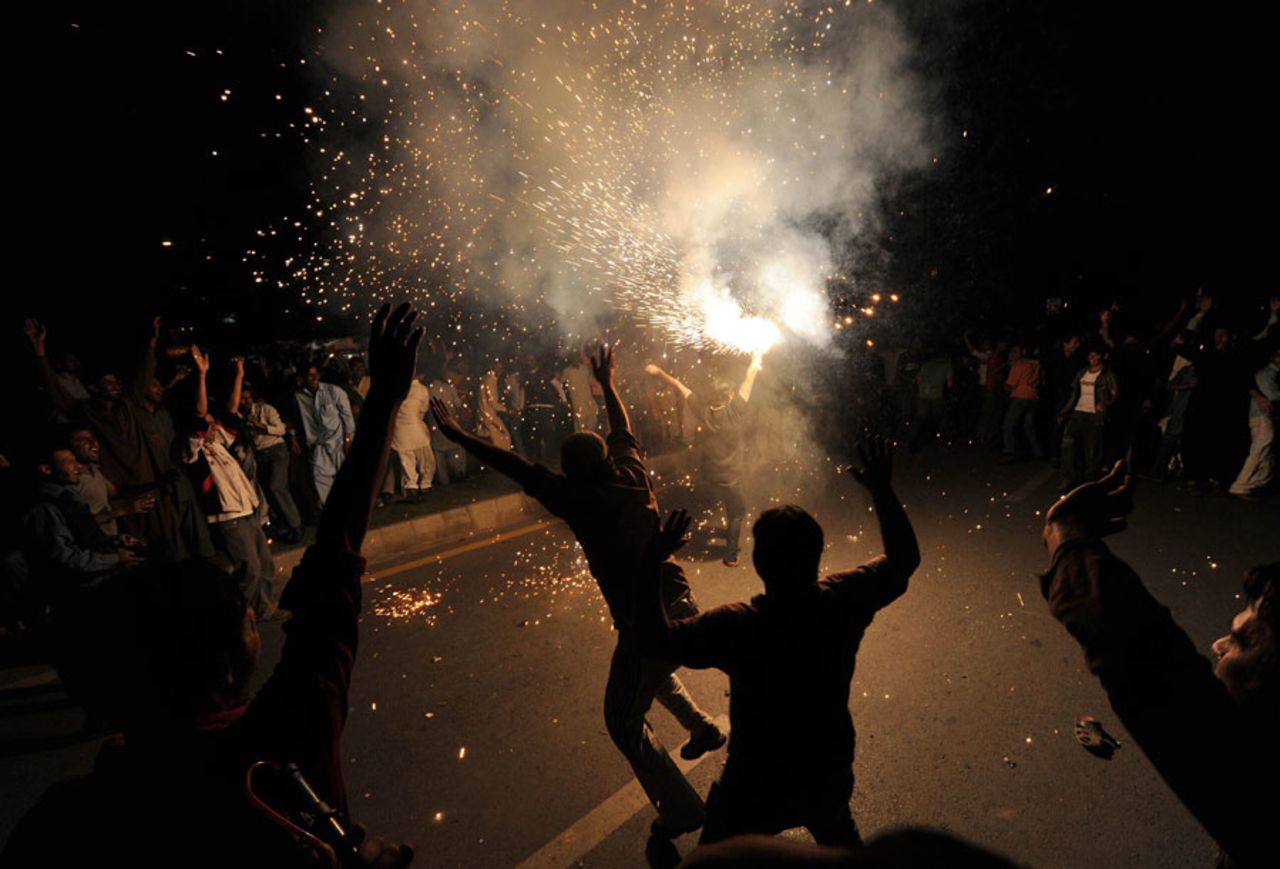 Pakistan fans in Islamabad celebrate their team's quarter-final victory against West Indies, Islamabad, March 23, 2011