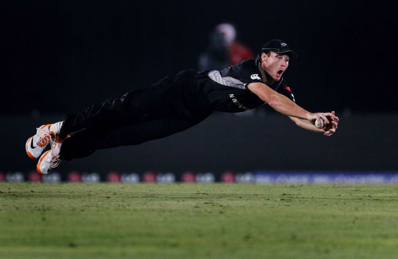 Martin Guptill leaps to stop a ball, New Zealand v South Africa, 3rd quarter-final, Mirpur, World Cup 2011, March 25, 2011
