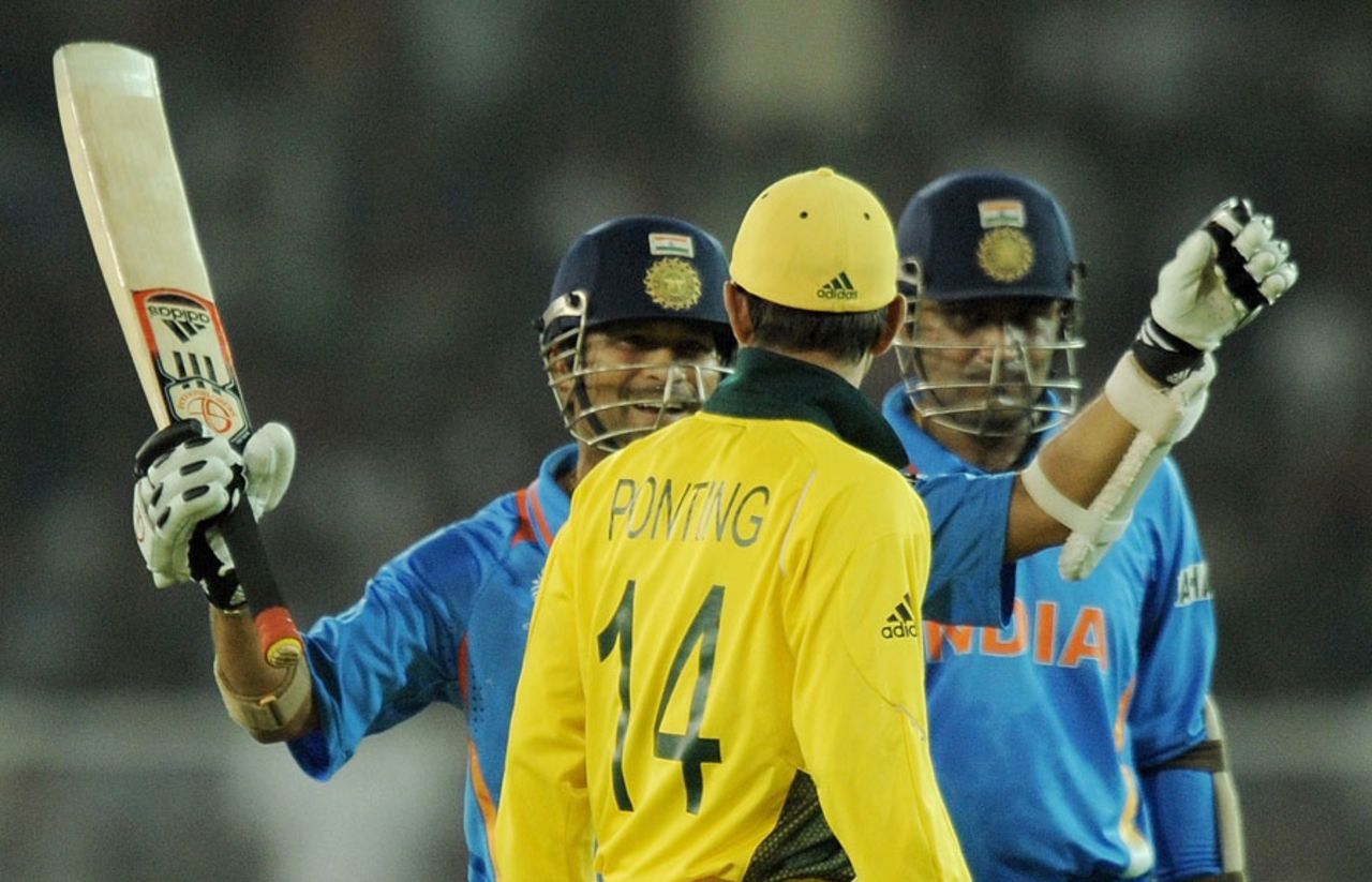 Sachin Tendulkar gestures to Ricky Ponting as Virender Sehwag looks on, India v Australia, 2nd quarter-final, World Cup, Ahmedabad, March 24, 2011