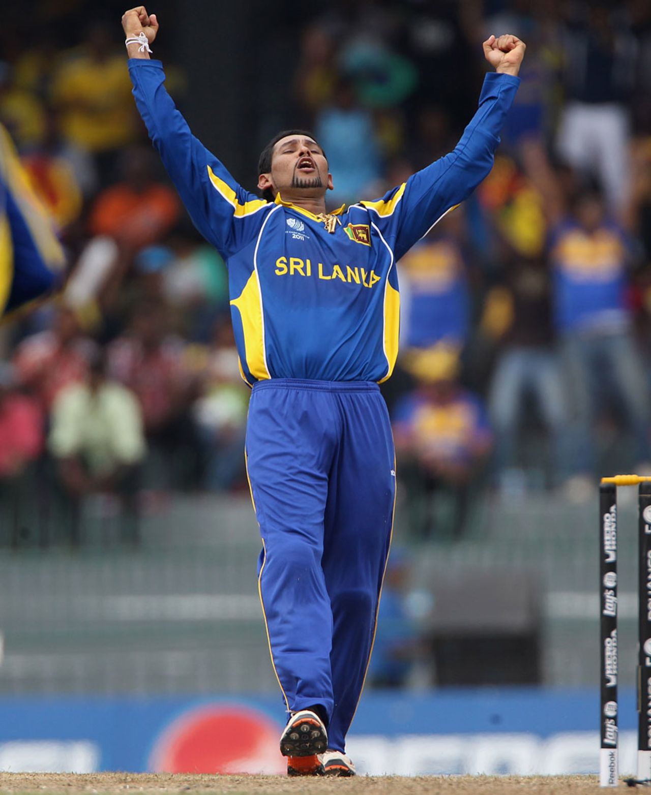 Tillakaratne Dilshan was rewarded for a tight spell when he removed Andrew Strauss, 4th quarter-final, World Cup 2011, Colombo, March 26 2011