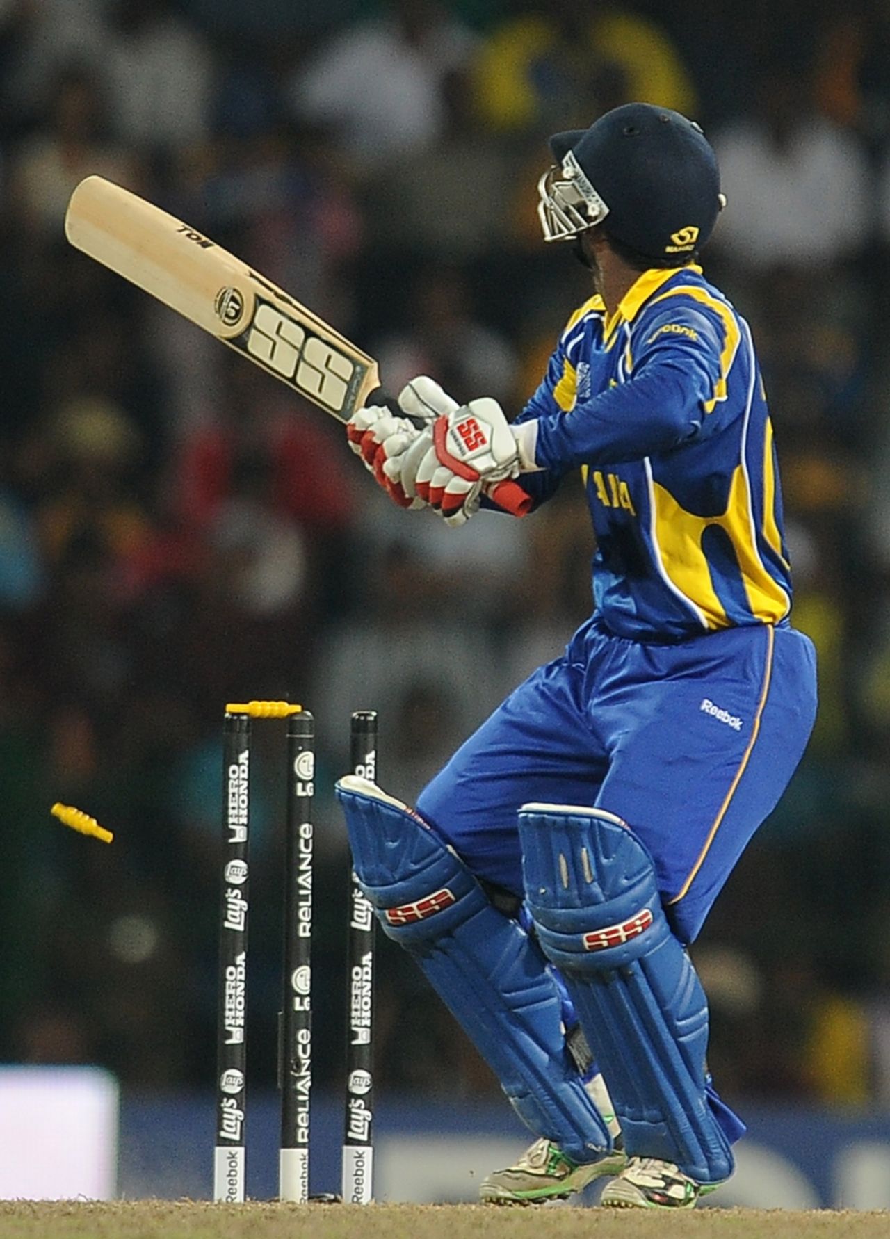 Chamara Silva was bowled for 13 to set up a thrilling finish, Sri Lanka v New Zealand, 1st semi-final, World Cup 2011, Colombo, March 29, 2011