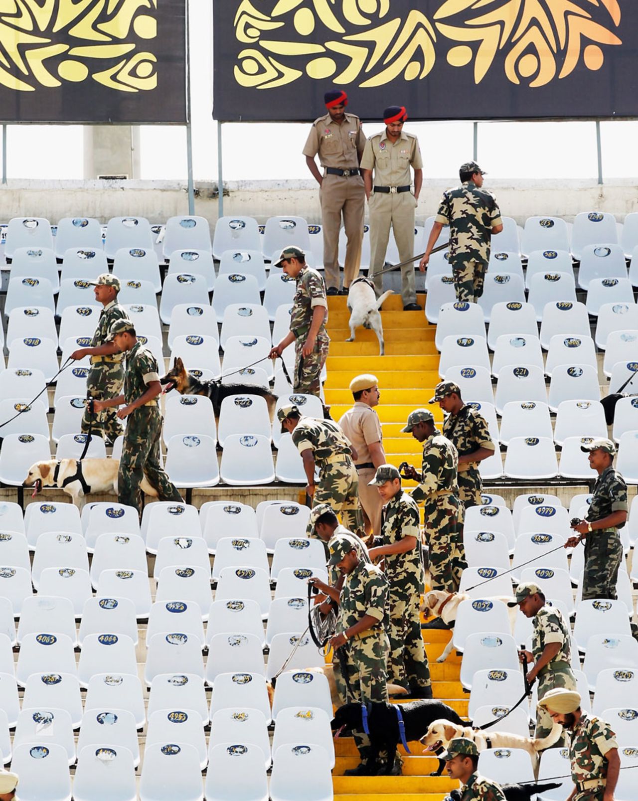 Security personnel with sniffer dogs pan out across the PCA stadium on the morning of the semi-final, World Cup 2011, Mohali, March 30, 2011