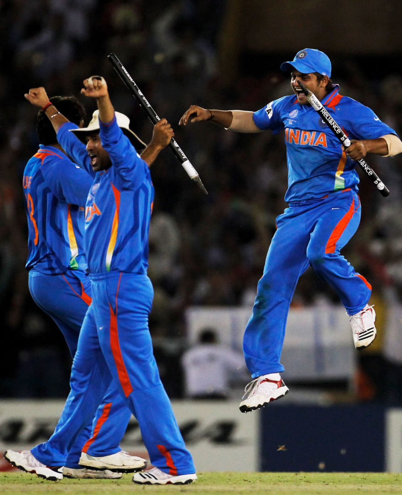 Sachin Tendulkar, Suresh Raina and Munaf Patel celebrate after India ended up winners, India v Pakistan, 2nd semi-final, World Cup 2011, Mohali, March 30, 2011