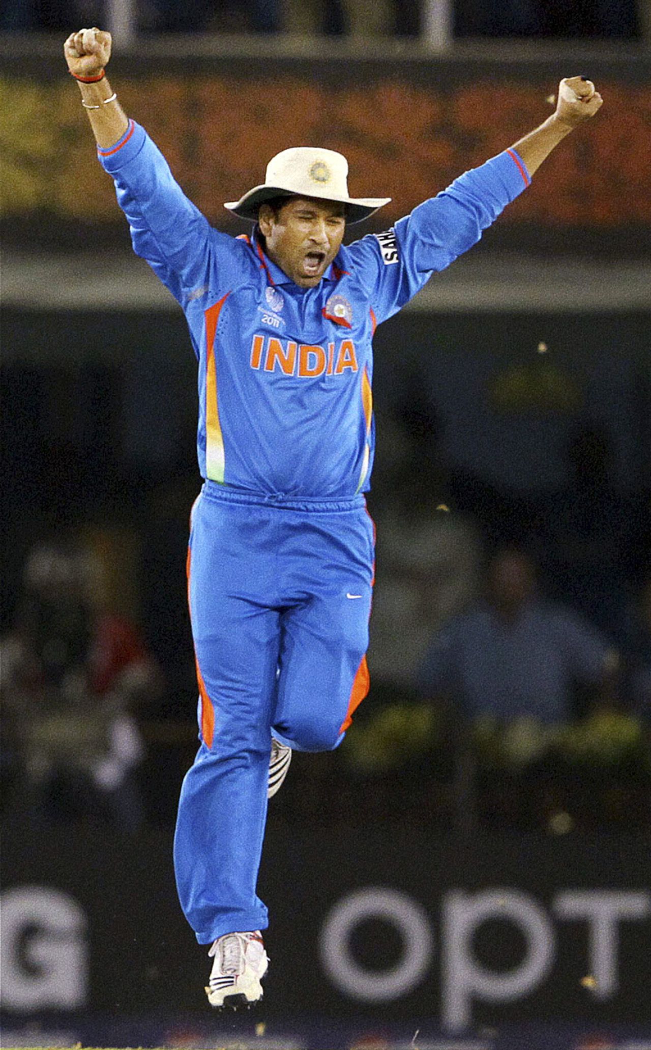 Sachin Tendulkar celebrates India's win with an ecstatic leap, India v Pakistan, 2nd semi-final, World Cup 2011, Mohali, March 30, 2011