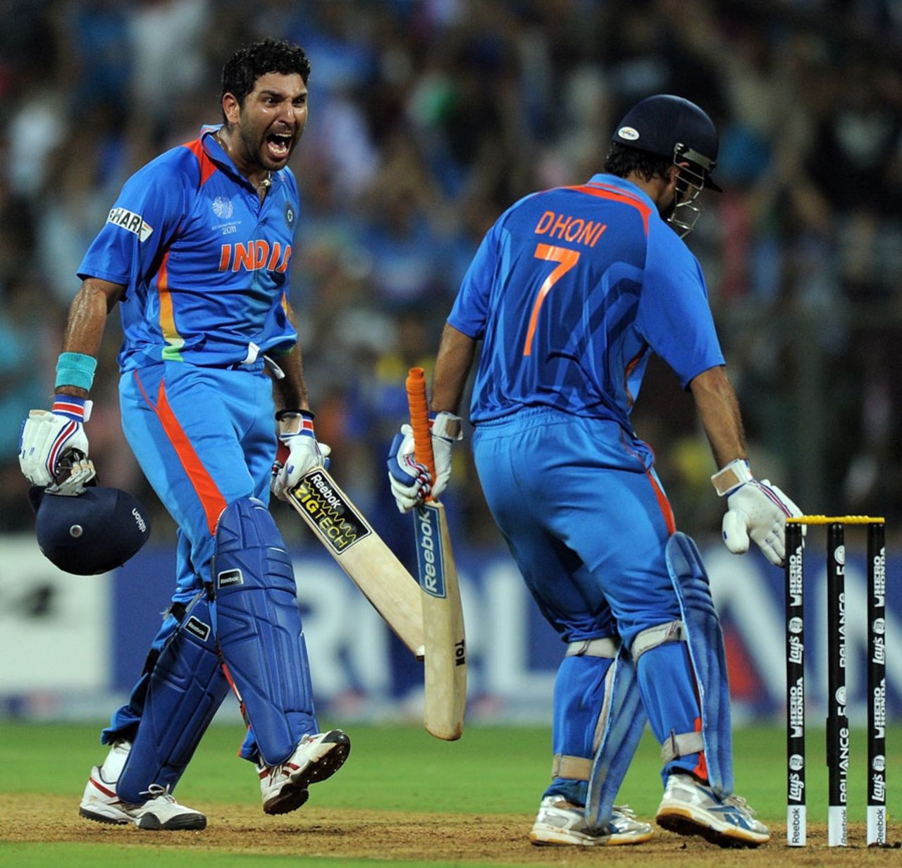 Yuvraj Singh roars as MS Dhoni uproots stumps after taking India to victory in the World Cup final, World Cup 2011, Mumbai, April 2, 2011