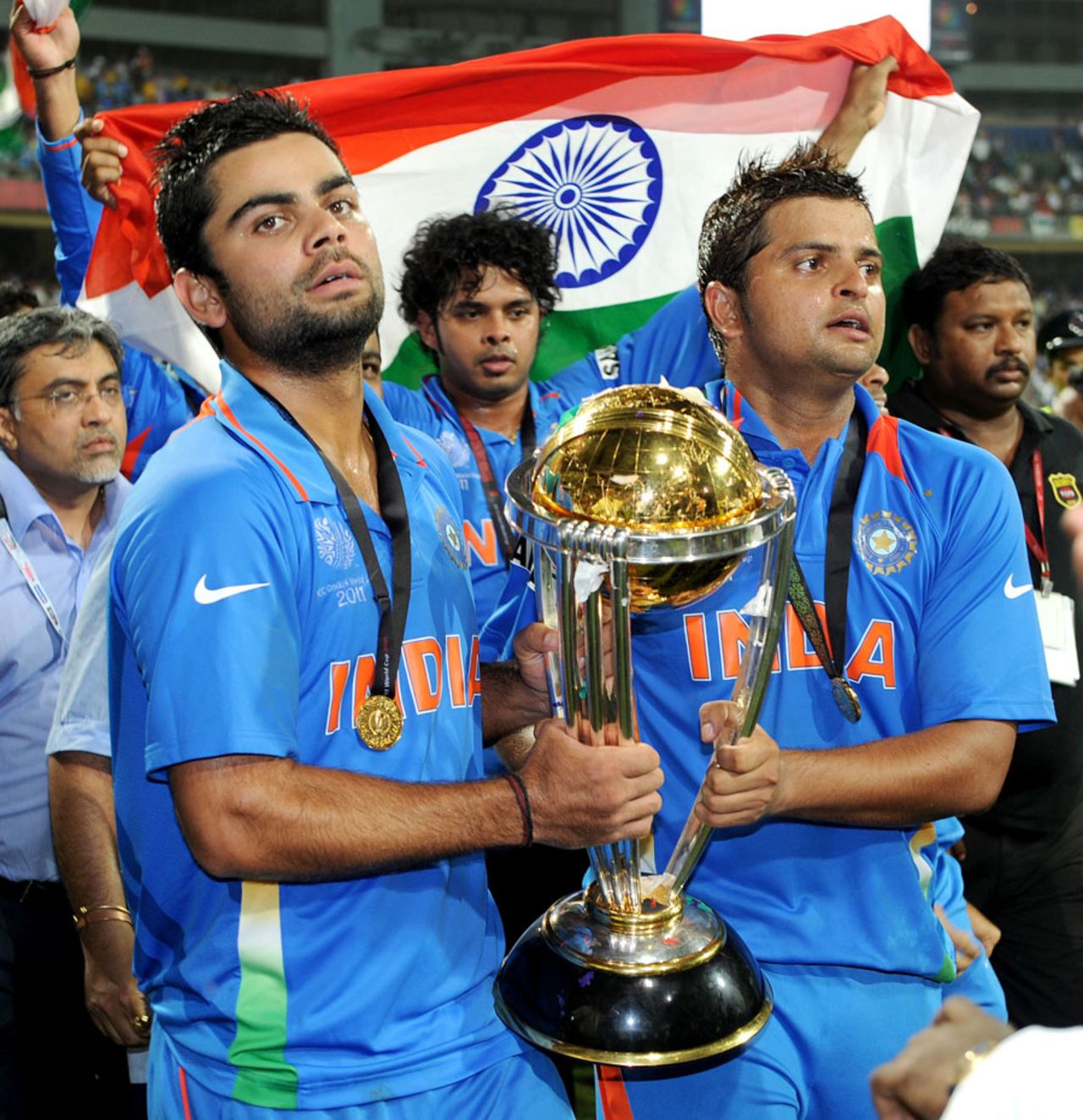 Virat Kohli and Suresh Raina hold the World Cup, while Sreesanth holds the Indian flag, India v Sri Lanka, final, World Cup 2011, Mumbai, April 2, 2011