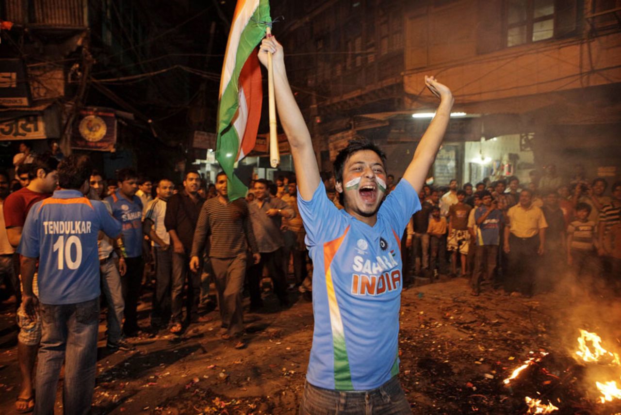 Fans in Delhi gather on the streets after India won the World Cup, April 2, 2011