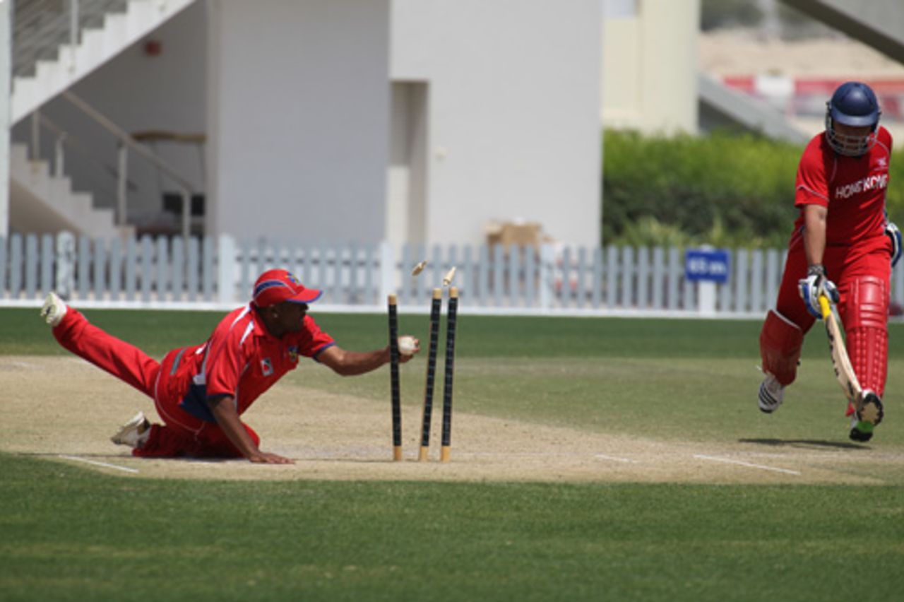 Roy Lamsam is run out for 78 in a warm-up game against Bermuda at the ICC WCL Division 2 tournament in Dubai on 2nd April 2011