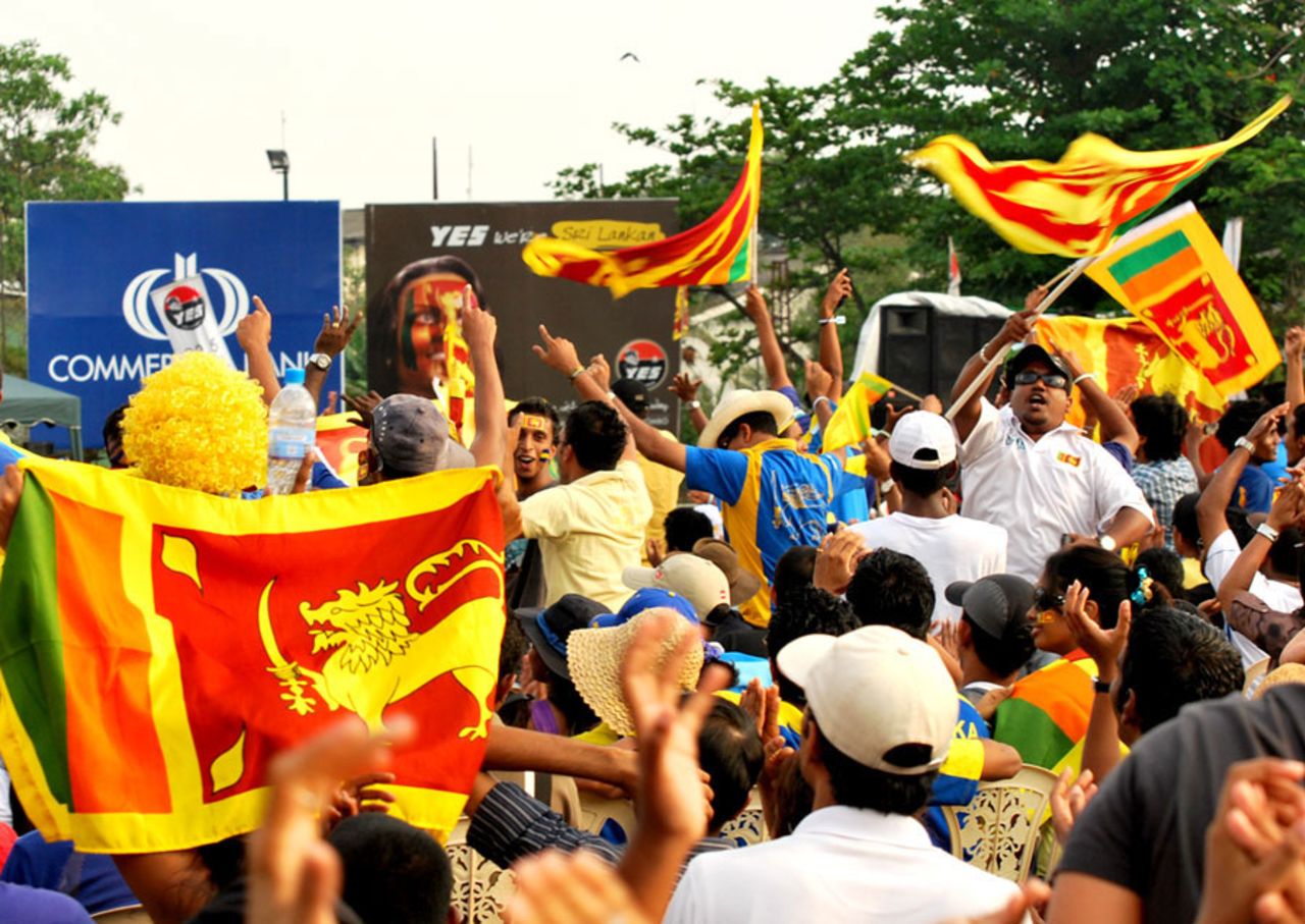 Sri Lankan fans watch the World Cup final on a big screen in Colombo, April 2, 2011
