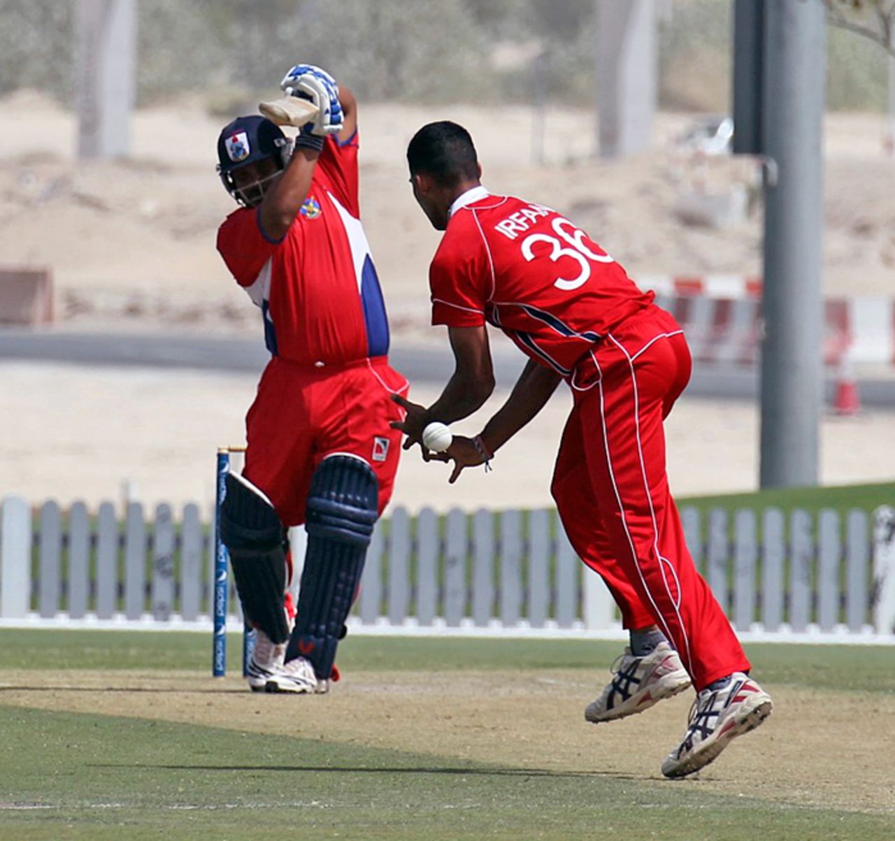 Bermuda's Jason Anderson is given an early life as Irfan Ahmed cannot not hold on to a return catch in the ICC WCL Division 2 match in Dubai on 9th April 2011