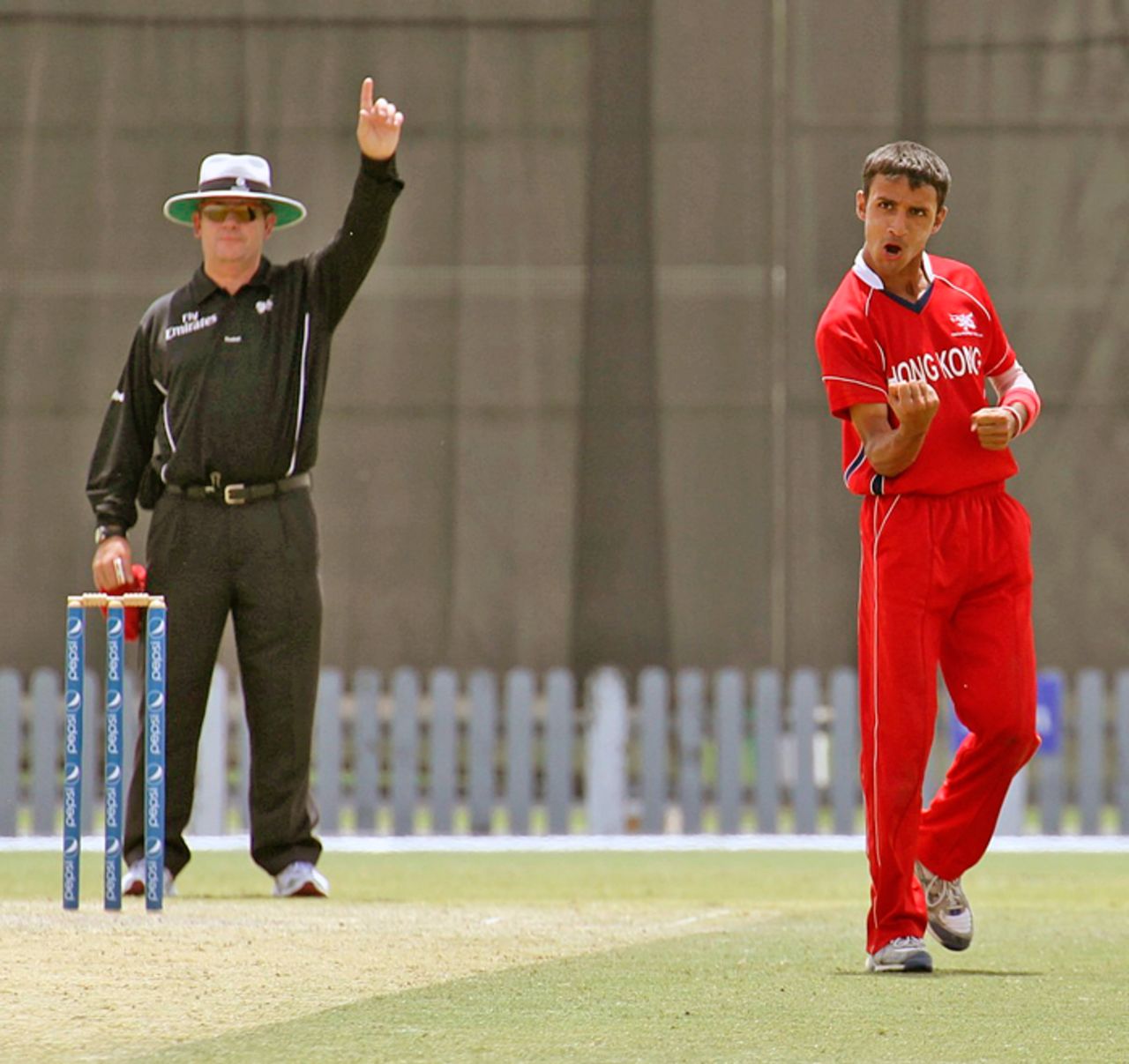 Asif Khan grabs a wicket for Hong Kong against Bermuda at the ICC World Cricket League Division 2 in Dubai on 9th April 2011