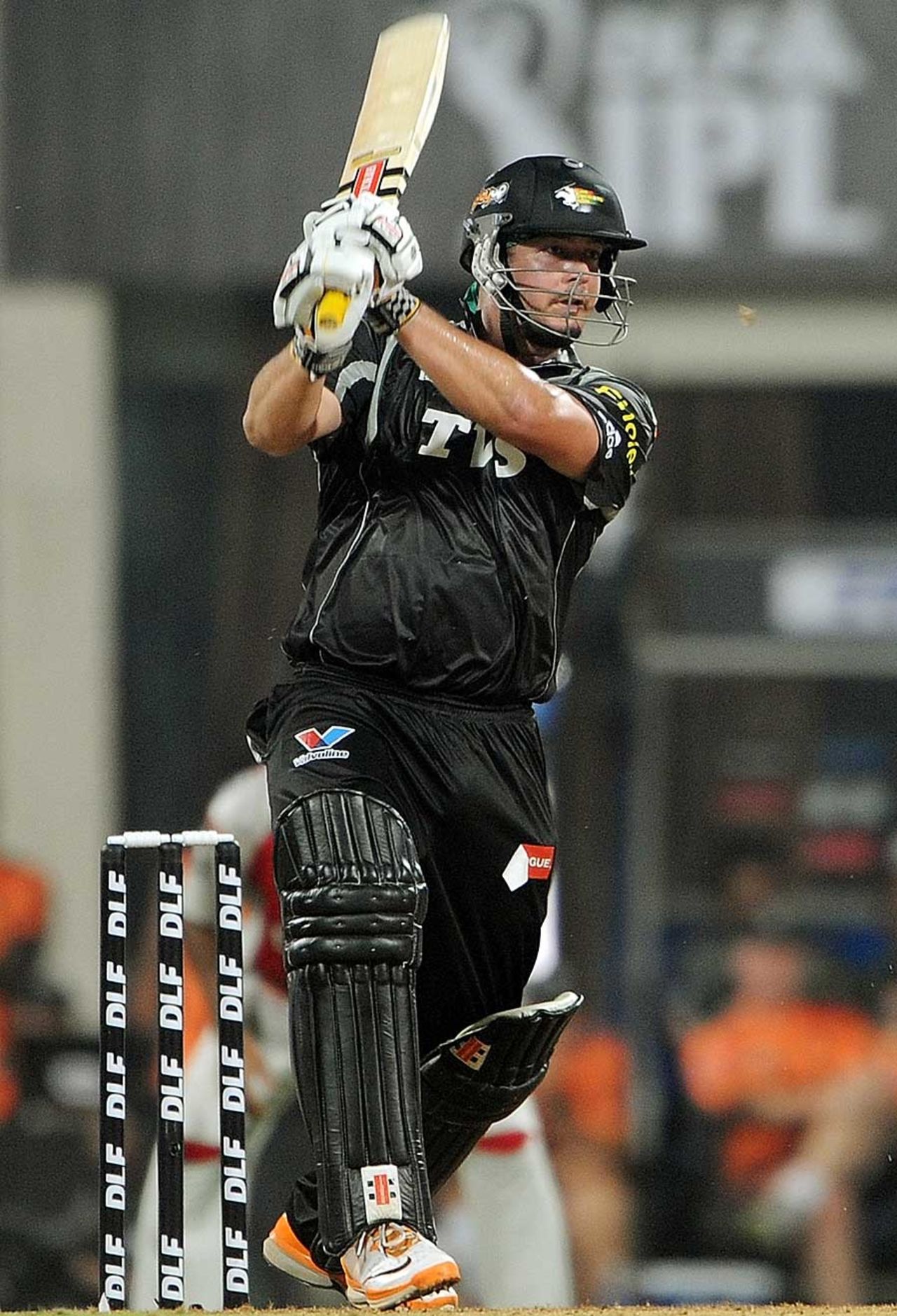 Jesse Ryder cracks one through the off side, Pune Warriors v Kings XI Punjab, IPL 2011, Mumbai, April 10, 2011