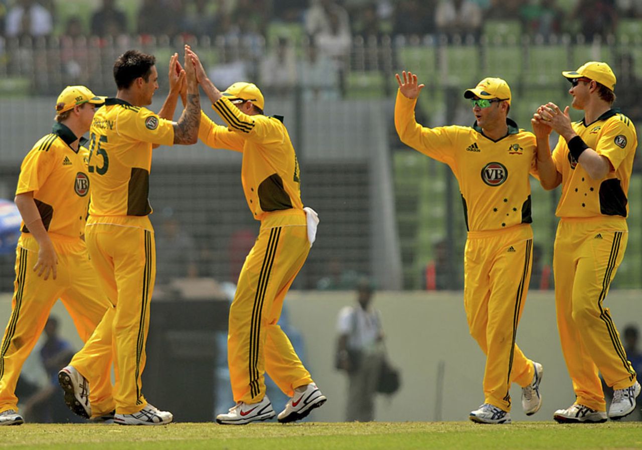 Australia celebrate after Mitchell Johnson struck early, Bangladesh v Australia, 2nd ODI, Mirpur, April 11, 2011