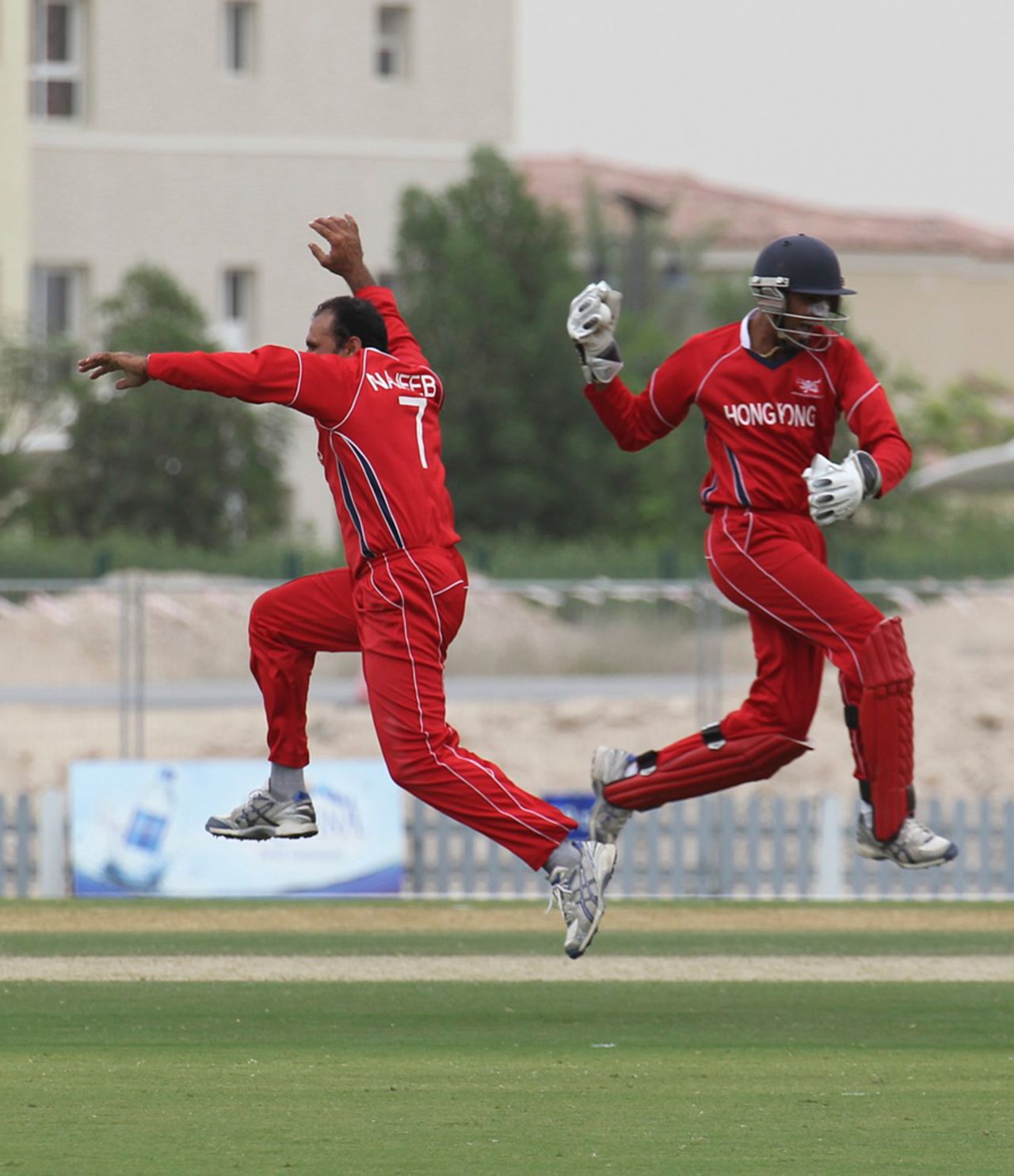 Najeeb Amar and Waqas Barkat celebrate the dismissal of Namibian captain Craig Williams at the ICC World Cricket League Division Two in Dubai on 14th April 2011