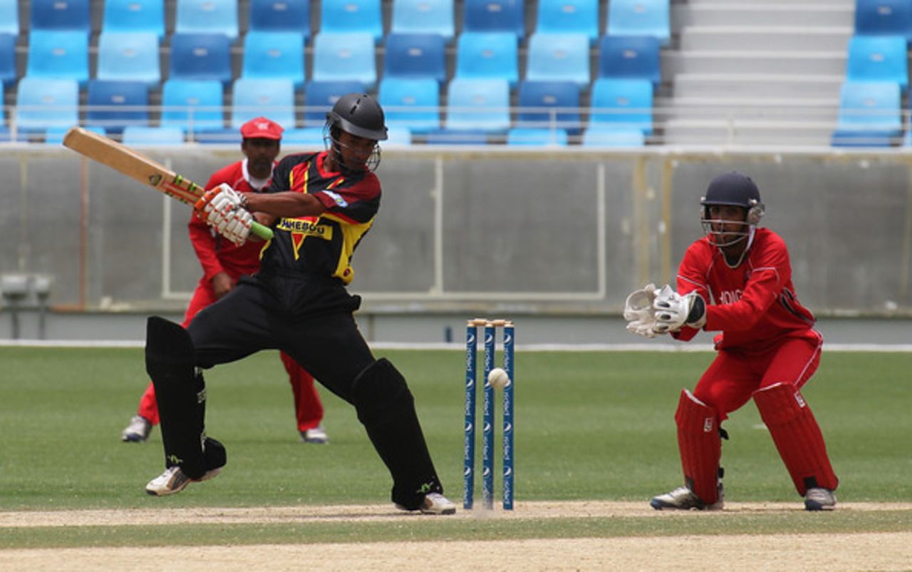 PNG's Asad Vala cuts the ball against Hong Kong in an ICC WCL2 match played at the DSC Stadium in Dubai on 12th APril 2011