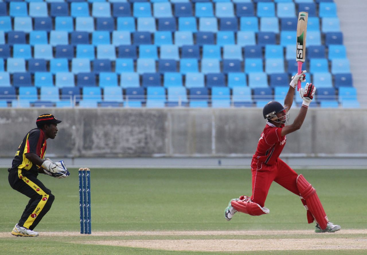 Nizakat Khan lofts down the ground during his innings of 55 against PNG during the ICC WCL2 match played at the DSC Stadium in Dubai on 12th April 2011