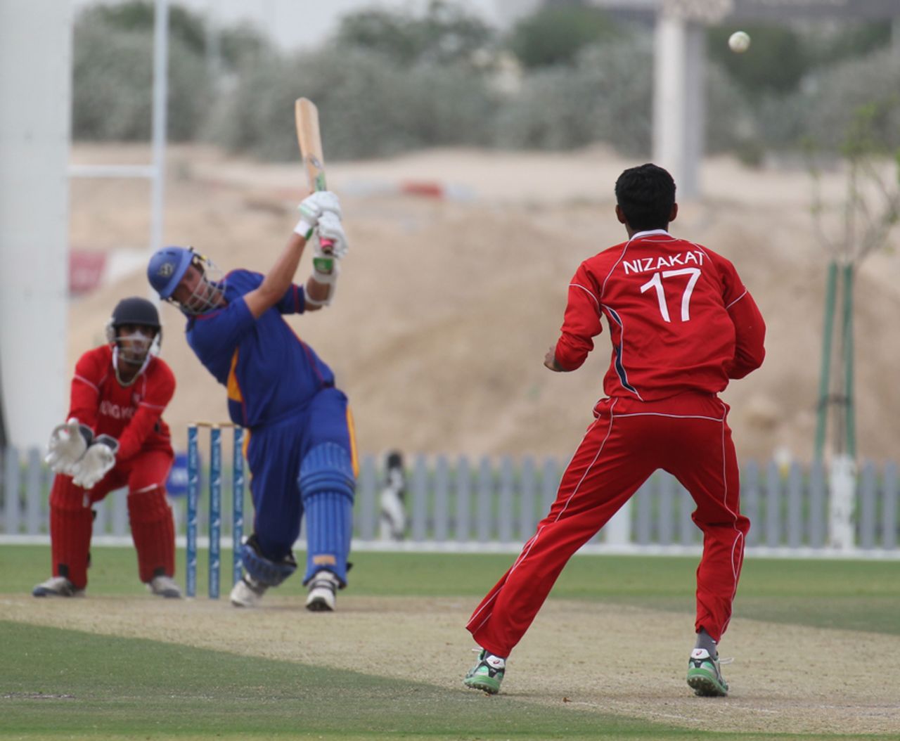 Gerrie Snyman slams a six off Nizakat Khan in his innings of 59 against Hong Kong at the ICC WCL2 in Dubai on 14th April 2011