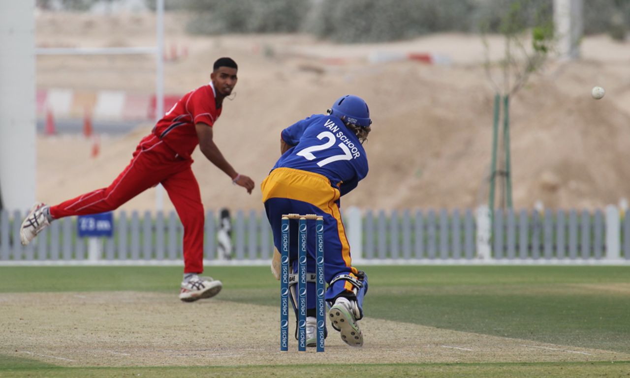 Irfan Ahmed induces a leading edge from Raymond van Schoor at the ICC WCL2 in Dubai on 14th April 2011