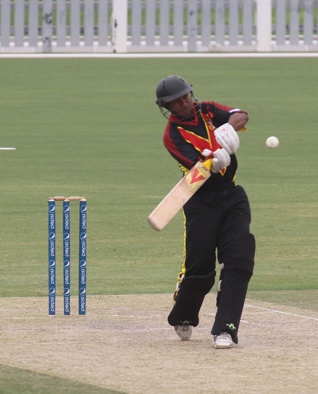 Vani Morea hits a boundary during his unbeaten 74 against Hong Kong in the 3rd/4th Play-off match at the ICC WCL2 in Dubai on 15th April 2011