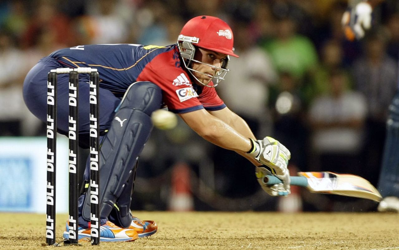 Aaron Finch reaches out to a wide one, Pune Warriors v Delhi Daredevils, Mumbai, April 17, 2011