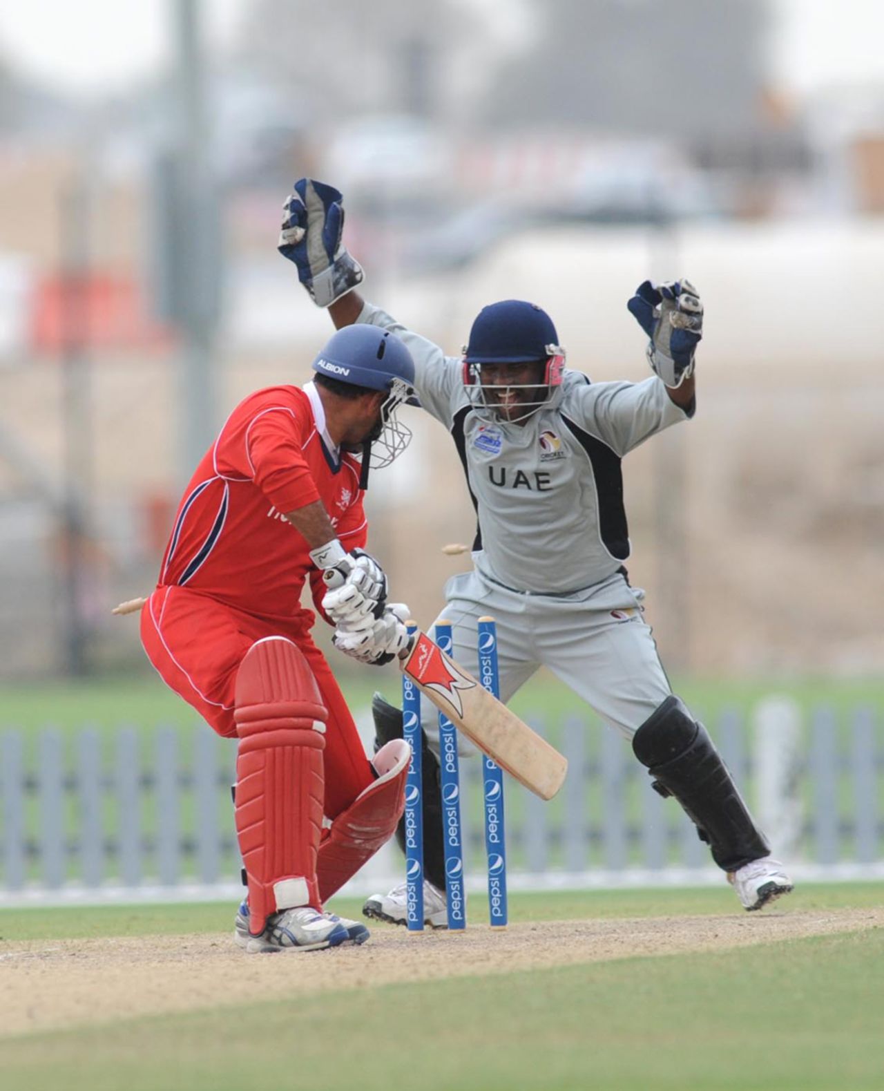 Hong Kong captain Najeeb Amar is clean bowled by Mohammed Tauqir for 15
