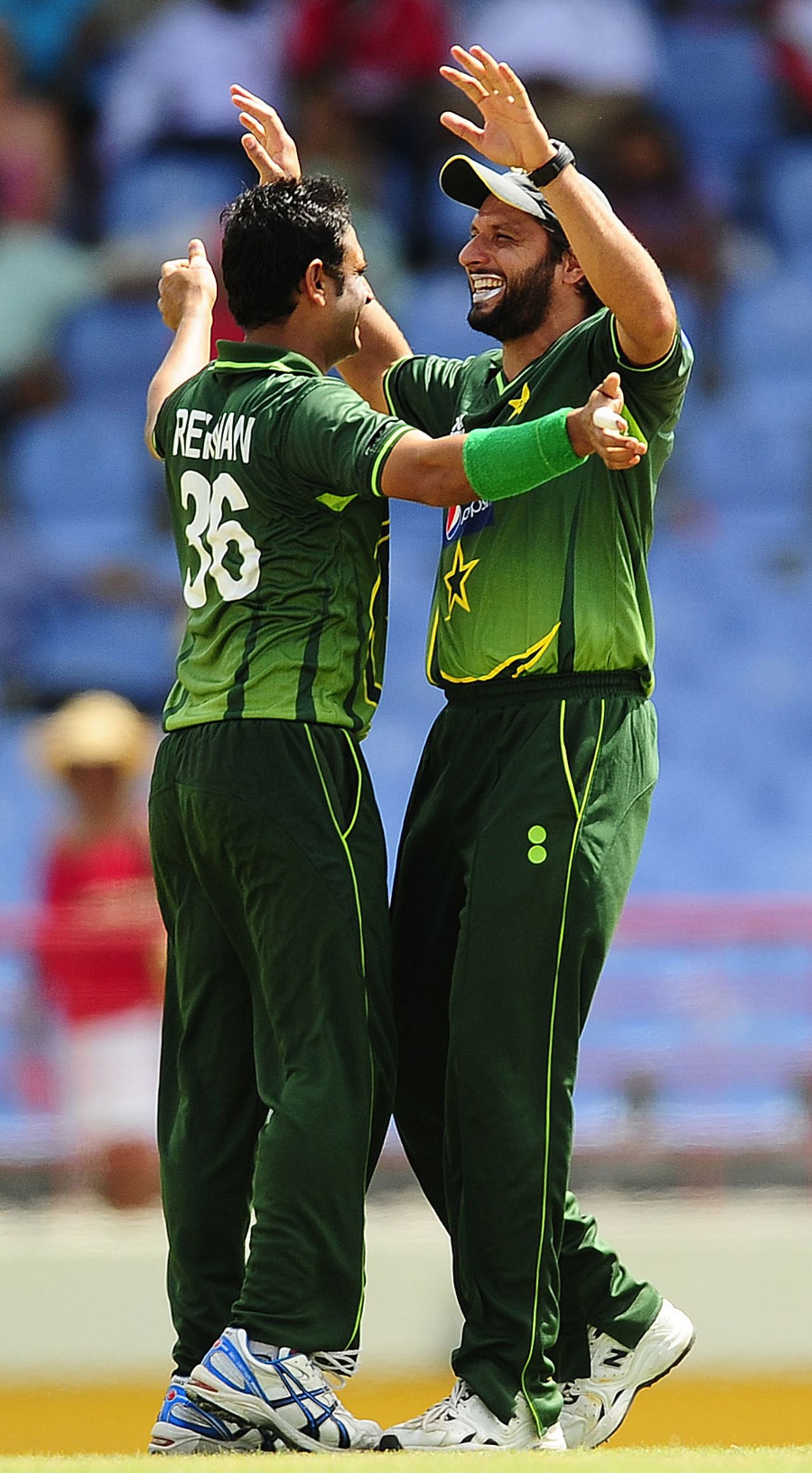 Pakistan captain Shahid Afridi celebrates the fall of a wicket with bowler Abdur Rehman , West Indies v Pakistan, Only Twenty20, St Lucia, April 21, 2010