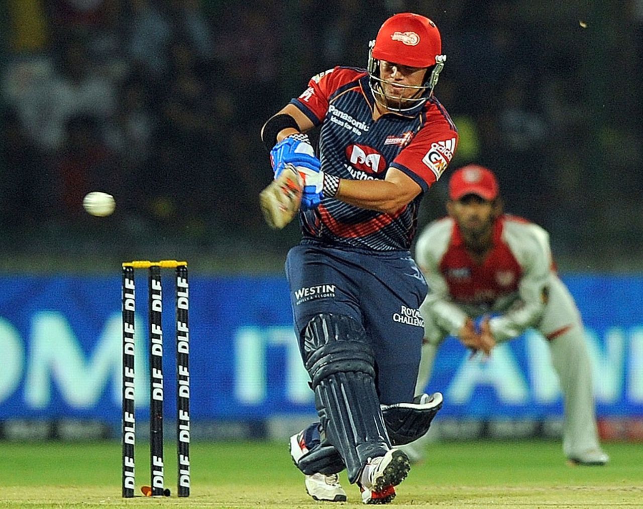 David Warner smashes a short ball through the leg side, Delhi Daredevils v Kings XI Punjab, IPL 2011, Delhi, April 23, 2011