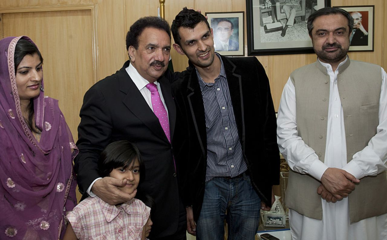 Pakistani Interior Minister Rehman Malik met Zulqarnain Haider and his family upon Haider's return to Pakistan, Islamabad, April 25, 2011
