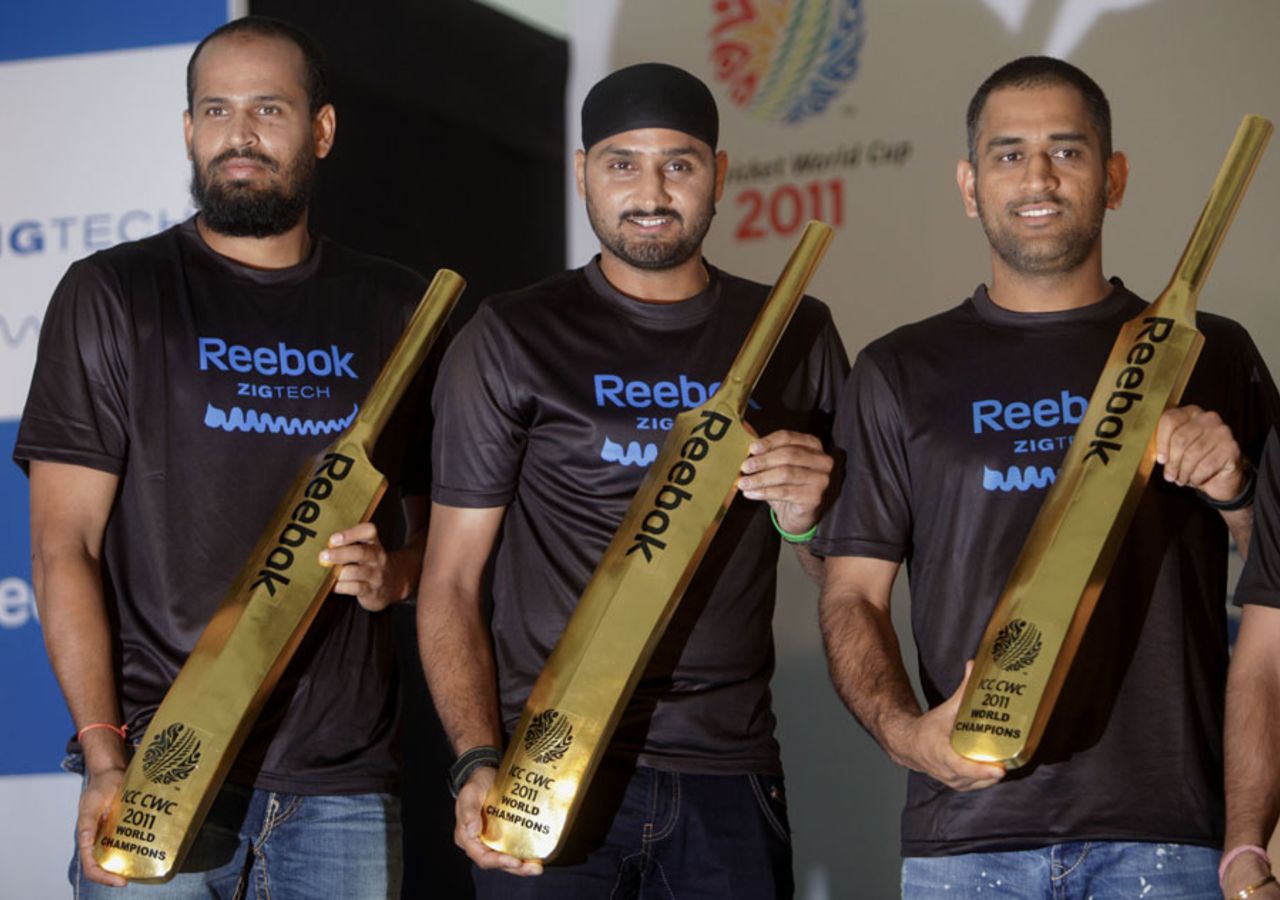 Yusuf Pathan, Harbhajan Singh and MS Dhoni at a promotional event, Mumbai, April 26, 2011