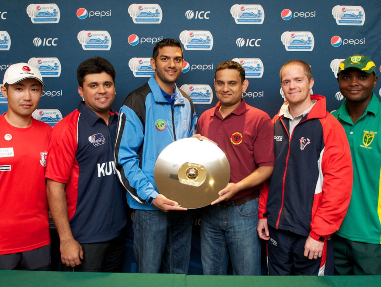 The captains of the six participating teams with the World Cricket League Division 7 trophy, Gaborone, Botswana, May 1, 2011