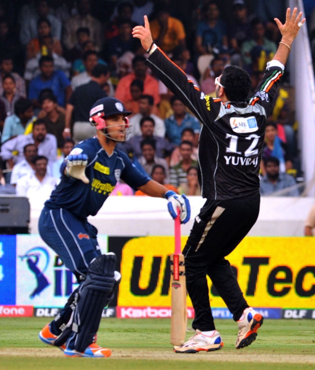 JP Duminy watches as Yuvraj Singh celebrates the fall of a wicket, Deccan Chargers v Pune Warriors, IPL 2011, Hyderabad, April 10, 2011