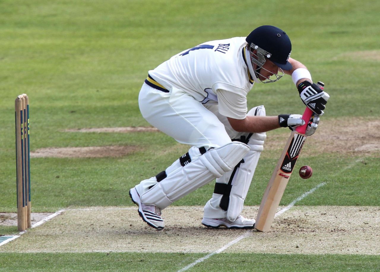 Ian Bell bends into an awkward position to defend on an unreliable pitch, Warwickshire v Worcestershire, County Championship Division One, Edgbaston, 1st day, May 11 2011