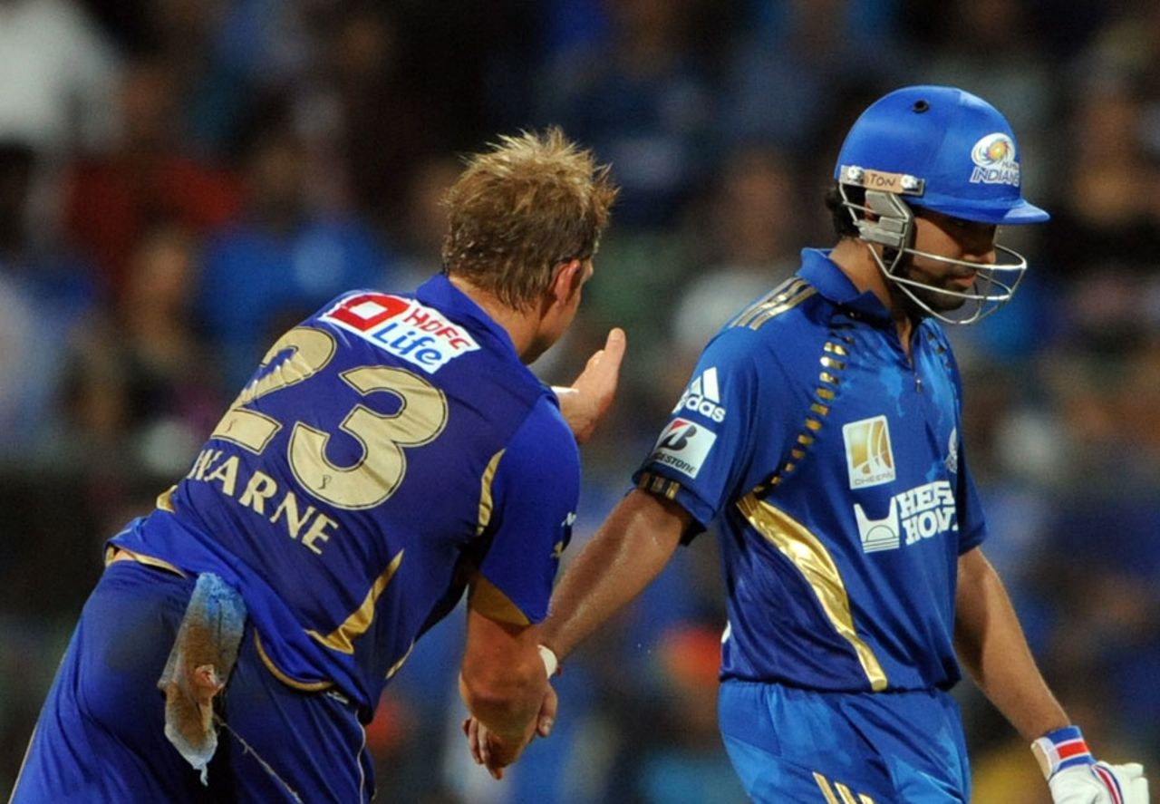 Shane Warne shakes hands with Rohit Sharma on his way out, Mumbai Indians v Rajasthan Royals, IPL 2011, Mumbai, May 20, 2011