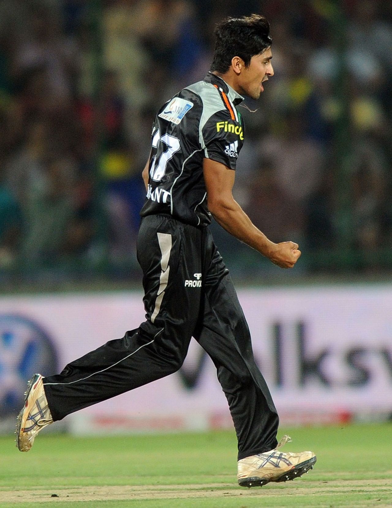 Shrikant Mundhe celebrates the wicket of Naman Ojha, Delhi Daredevils v Pune Warriors, IPL 2011, Delhi, May 21, 2011 