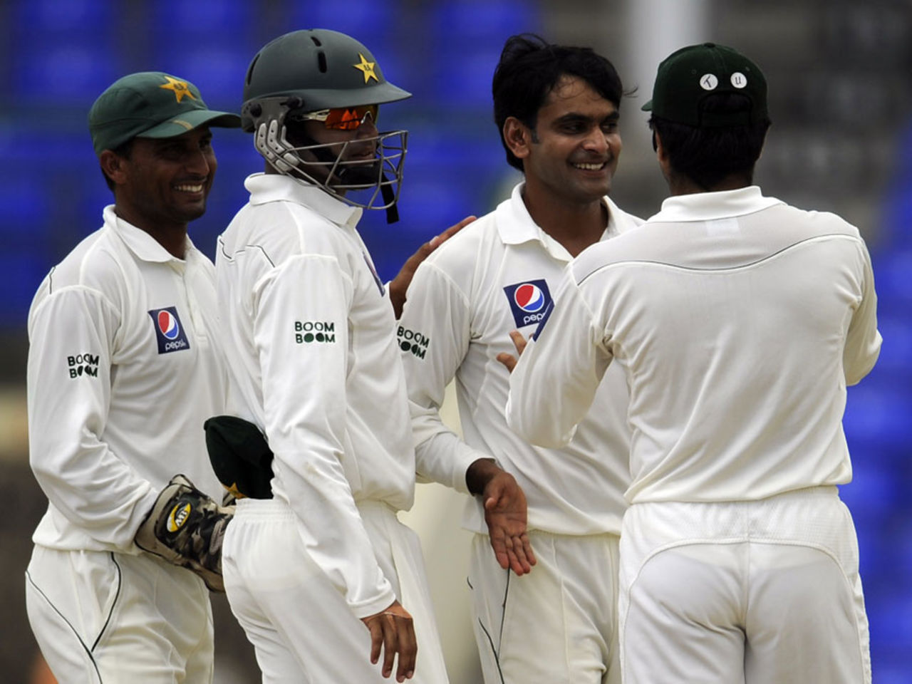 Mohammad Hafeez is congratulated on dismissing Kemar Roach, West Indies v Pakistan, 2nd Test, St Kitts, 3rd day, May 22, 2011
