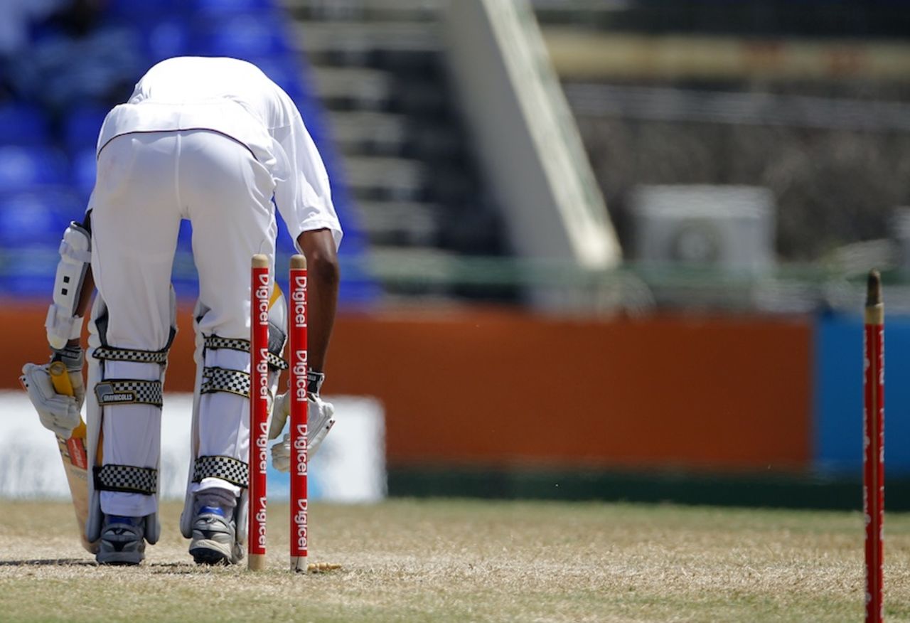 Kraigg Brathwaite slumps as his stump cartwheels, West Indies v Pakistan, 2nd Test, St Kitts, 4th day, May 23, 2011
