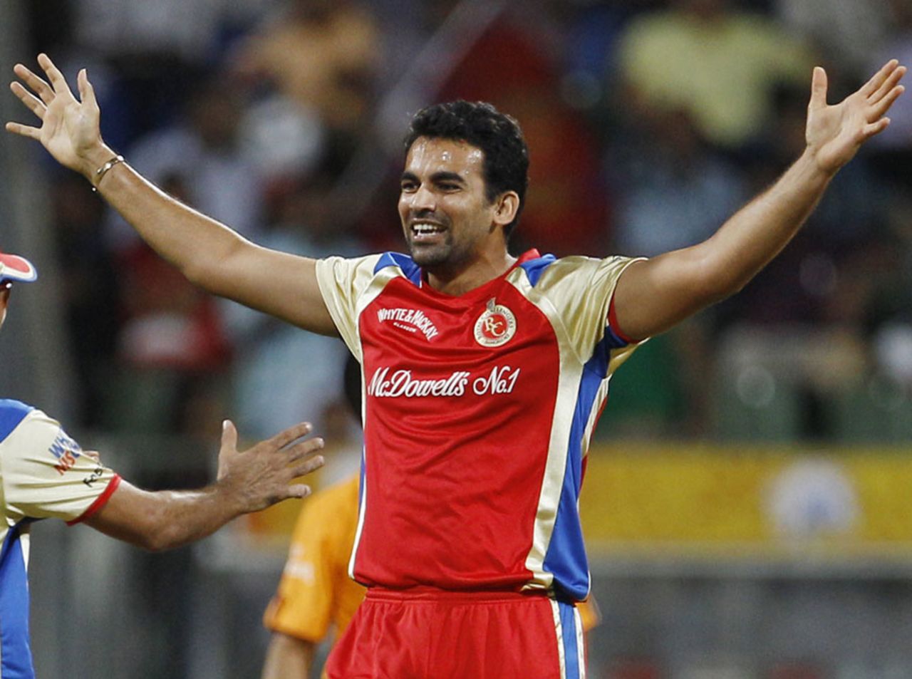 Zaheer Khan is delighted after getting the wicket of Michael Hussey, Bangalore v Chennai, 1st qualifier, IPL 2011, Mumbai, May 24, 2011