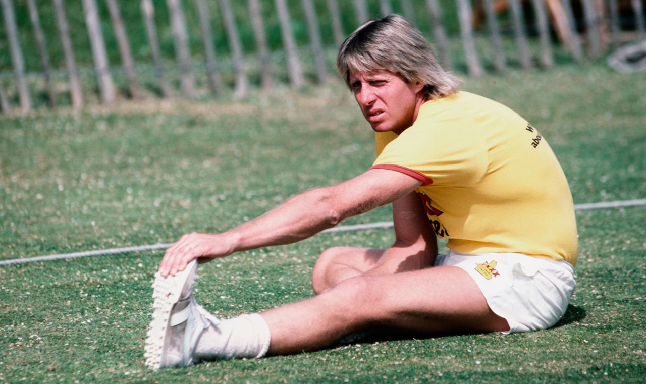 Jeff Thomson stretches his calf muscles, June 1, 1983